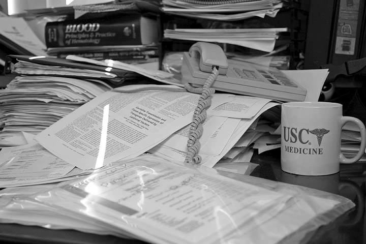 Papers strewn across office in un organised mess